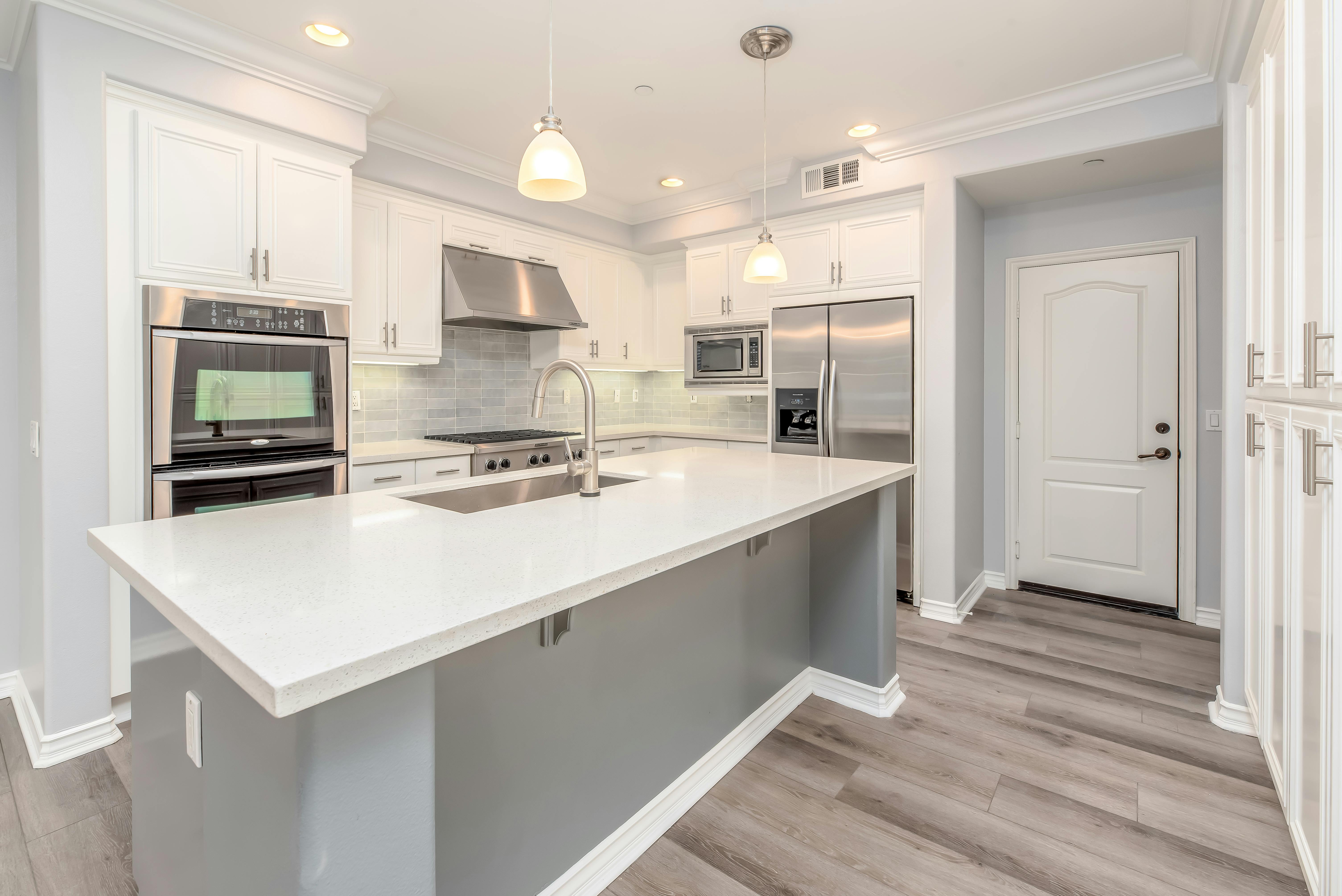 A contemporary kitchen featuring high-end finishes